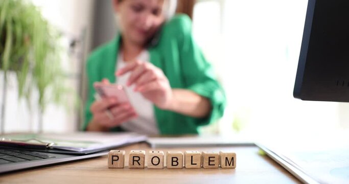 Businesswoman communicates with problem client on phone. Order error and problems at work