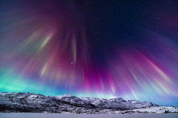 Aurora storm in the mountains