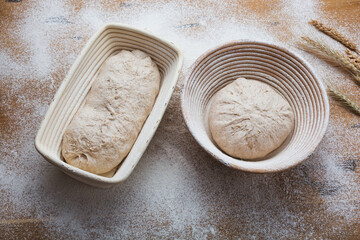 Bread proofing Whole grain dough in rattan baskets before baking Yeast-free sourdough bread