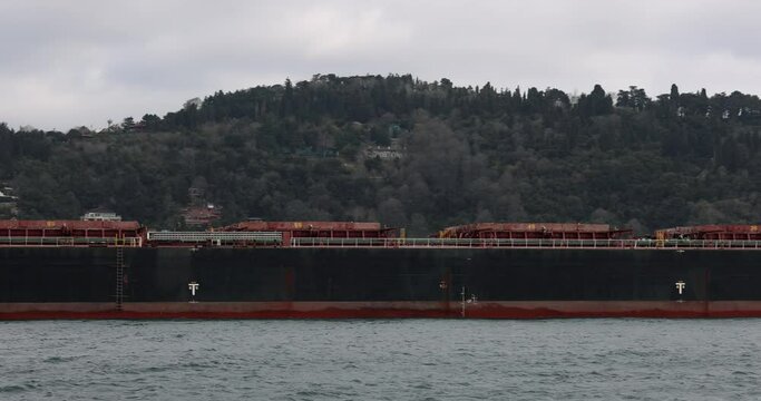 Cargo ship with tankers transports cargo by sea. Maritime logistics and delivery of goods