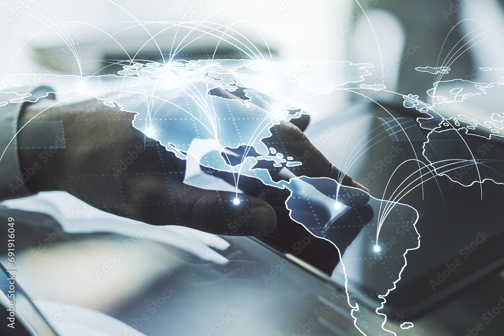 Poster double exposure of abstract digital world map with connections and hand working with a digital table