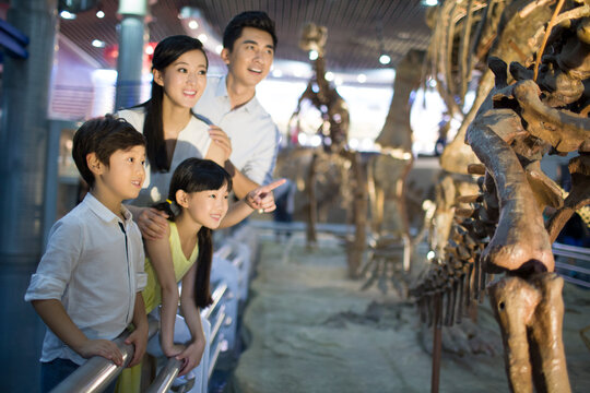 Young family in museum of natural history