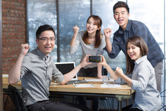 IT workers developing smart phone