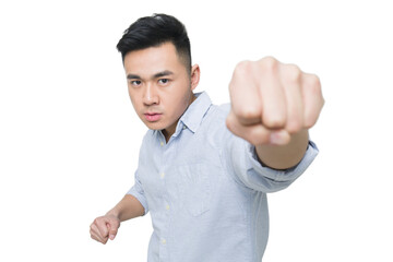 Young man punching towards the camera