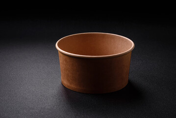 A cylindrical container made from environmentally friendly recycled materials for takeaway food