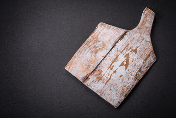 Empty wooden cutting board for preparing ingredients for preparing a delicious dish