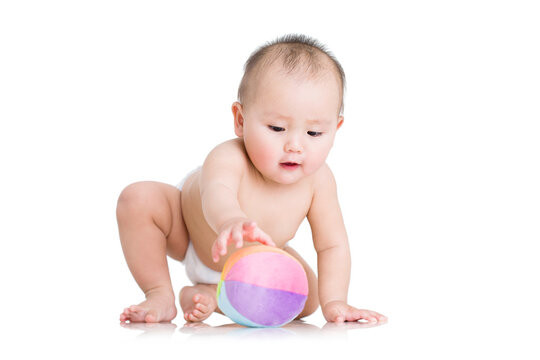 Cute baby boy with ball
