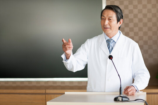 Senior male doctor giving a speech