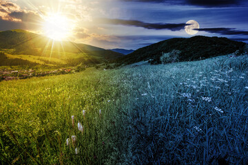 mountainous rural landscape with pasture. herbs on hill and sun and moon on the sky at summer...