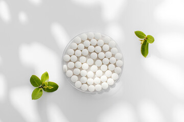 White round tablets with a natural composition. Tablets, minerals and vitamins. 