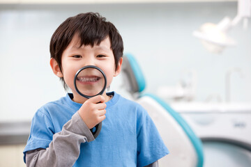 Cute little boy in dental clinic