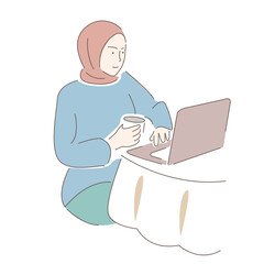 Muslim girl working at the computer