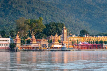 Foto op Aluminium views of rishikesh city crossed by ganges river, india © jon_chica
