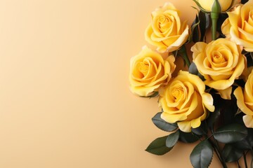  a bouquet of yellow roses with green leaves on a yellow background with a place for a text or a picture.