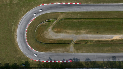 Aerial top view of Circuit motor racing track, Track for auto racing top view, Car race asphalt and...