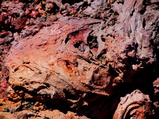 Detail of red rocks from pahoehoe lava flows eruption of Fournaise volcano, Reunion, France