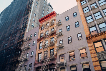 Typical New York apartment blocks with fire escape at the front in NoHo, New York City, USA. © Alena