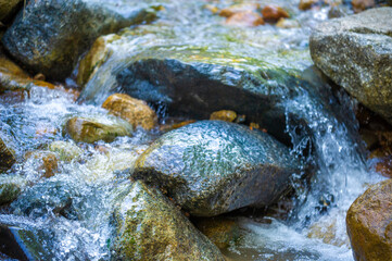 Witness the mesmerizing dance of water and stones. Experience a harmonious display of grace and...