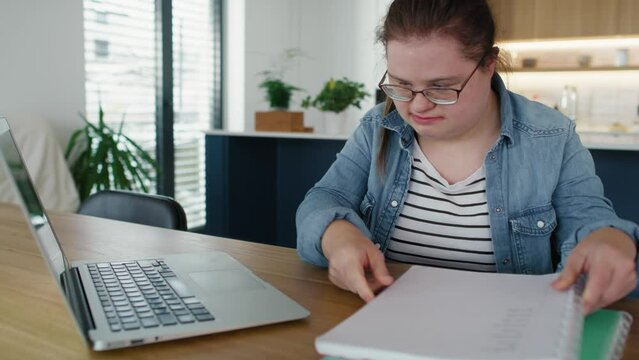 Down syndrome studying at home and feeling stressed. Shot with RED helium camera in 8K