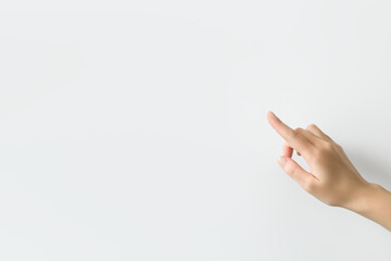 hand pointing finger at empty space on white background