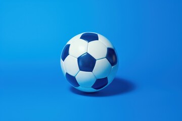 Fototapeta na wymiar a close up of a soccer ball on a blue background with a copy - space in the bottom right corner.