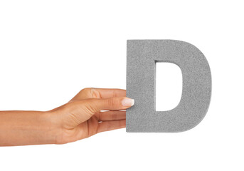 Hand of woman, capital letter D and presentation of consonant isolated on white background. Character, font and palm with English alphabet typeface for communication, reading and writing in studio. - obrazy, fototapety, plakaty