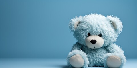 sad light blue teddy bear, on a blue background, blue monday, copy space, banner - obrazy, fototapety, plakaty
