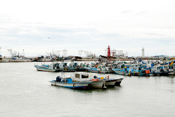 fishing boats and lighthouses