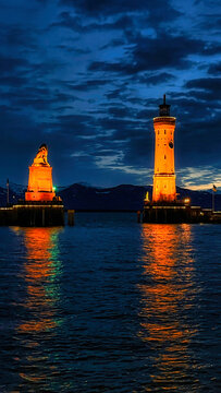 lighthouse at dusk, Lindau harbor, Germany