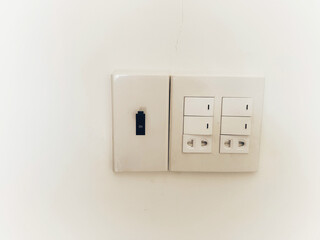 The power outlet is designed with 2 sockets , 4 switches of light and breaker