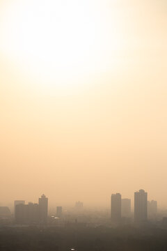 PM 2.5 dust in Bangkok, Thailand. Covered by heavy smog, Misty sunset in downtown with bad air pollution, Bad air pollution in City. Landscape with bad air pollution and Dangerous