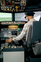 Airplane pilot controls throttle during flight or takeoff Cockpit view of air traffic control