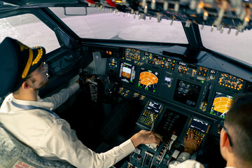 Airplane cabin Pilots check airplane electronics by pressing buttons Passenger airliner preparation...