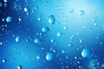  a close up of water droplets on a window pane with a blue sky in the background and a blue sky in the foreground.