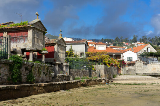 Fishing village of Combarro with the typical horreos (fish drying sheds). Galicia, Spain.