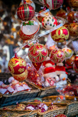 Christmas baubles on a stall, with a shallow depth of field