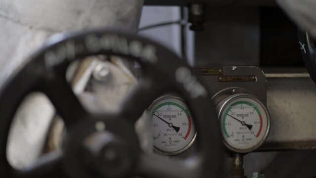 Manometers and valve hand wheel of auxiliary steam boiler system