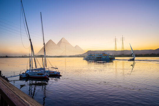 Nile River and boats and pyramids