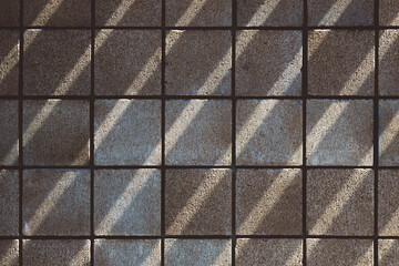 Background of brick wall texture with shadow and sunlight. Architectural background.