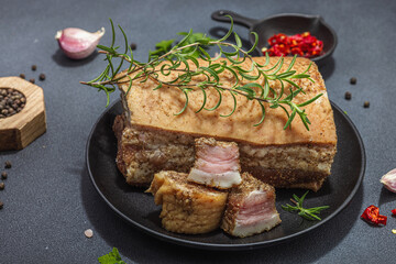 Piece of salty high-fat meat cooked with spices. Salo, bacon, lard, silverside, gammon