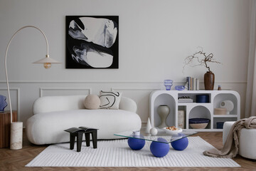 Interior design of modern living room interior with mock up poster frame, stylish sofa, glass...