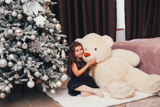 girl in home christmas room