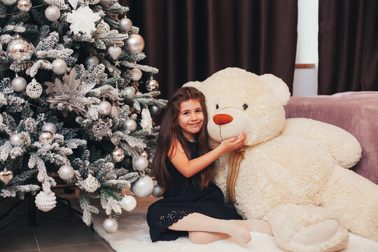 girl in home christmas room