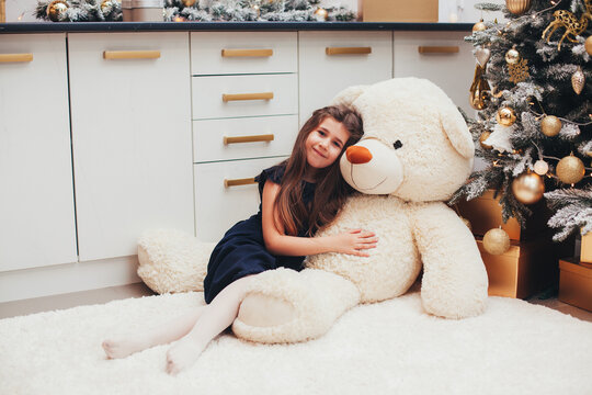 girl in home christmas room