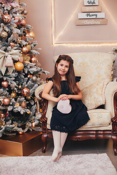 girl in home christmas room