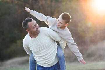 father walks with child emotions concept family