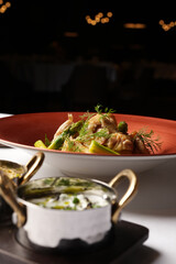 Trout fish with asparagus, potatoes and vegetables