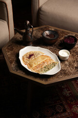 Traditional azerbaijani cuisine flat bread with herbs and meat