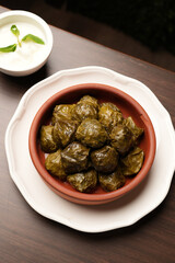 Delicious dolma, stuffed grape leaves with lamb meat.