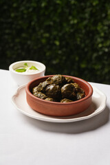Delicious dolma, stuffed grape leaves with lamb meat.